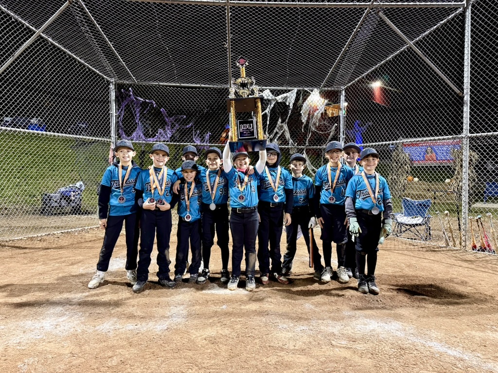 The 2026 10U Night Trains team celebrating with their McKeesport Halloween Havoc runner-up trophy and medals